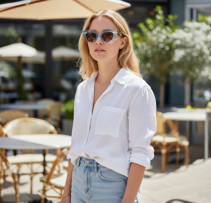 Woman wearing Ocean blue and tortoise-shell acetate cat eye sunglasses for wide nose bridge low nose bridge and high cheek bones